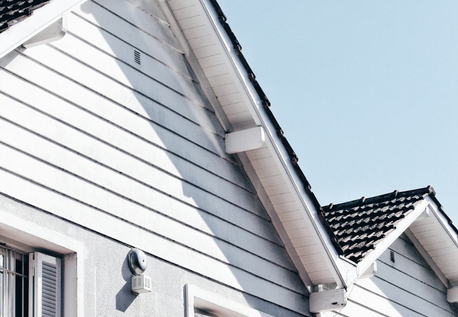 Storm damaged roof showing hail damage on shingles